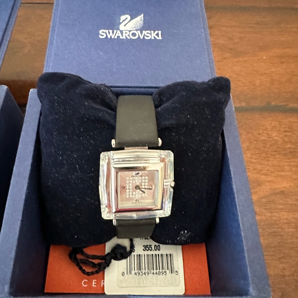 Swarovski Black and Silver Square Watch
Great condition.